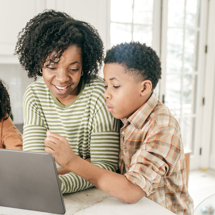 Parent planning a vacation with their children