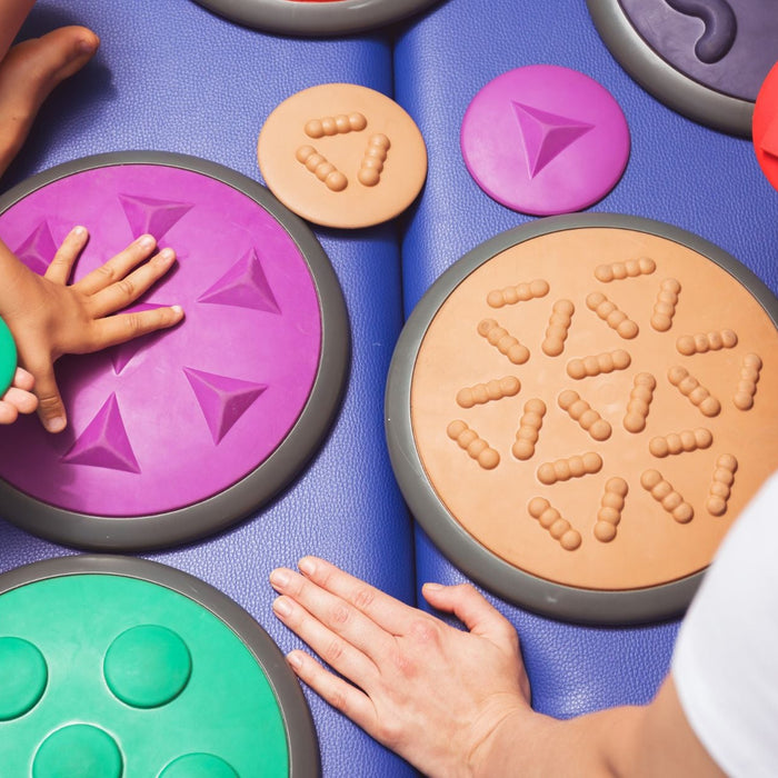 Individuals engaging with sensory-friendly experience at an event